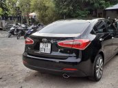 Nhu cầu đổi xe 7 chỗ nên bán Kia K3 1.6AT 2014