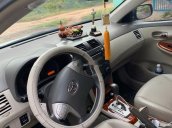 Gia đình bán Toyota Corolla Altis 1.8G năm 2010, màu bạc