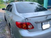 Gia đình bán Toyota Corolla Altis 1.8G năm 2010, màu bạc