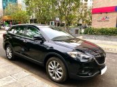 Cần bán xe CX9, sản xuất 2013, số tự động, nhập Nhật, màu đen huyền thoại