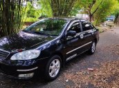 Bán xe Toyota Corolla Altis đời 2004, màu đen còn mới