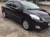 Gia đình bán xe Toyota Vios 1.5 E sản xuất 2011, màu đen
