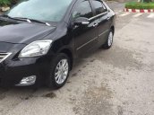 Gia đình bán xe Toyota Vios 1.5 E sản xuất 2011, màu đen
