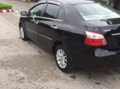 Gia đình bán xe Toyota Vios 1.5 E sản xuất 2011, màu đen
