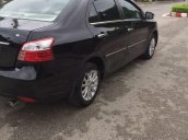 Gia đình bán xe Toyota Vios 1.5 E sản xuất 2011, màu đen
