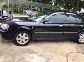 Bán Ford Laser GHIA 1.8 MT 2003, màu đen, chính chủ