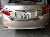 Bán xe cũ Toyota Vios đời 2016, màu vàng