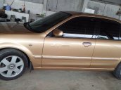 Chính chủ bán Ford Laser năm sản xuất 2003, màu vàng, xe nhập