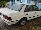 Cần bán gấp Nissan Bluebird đời 1990, màu trắng, nhập khẩu xe gia đình