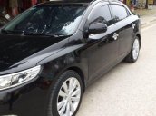 Bán xe Kia Forte sản xuất 2010, màu đen 