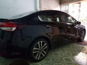 Bán Kia Cerato 1.6AT đời 2016, màu đen xe gia đình