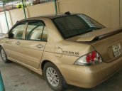 Cần bán lại xe Mitsubishi Lancer đời 2004, màu vàng xe gia đình, giá chỉ 230 triệu