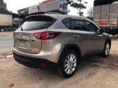 Bán xe Mazda CX 5 đời 2013, màu vàng cát