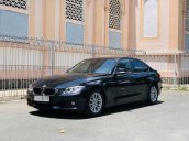 Cần bán xe BMW 320i đời 2014, màu đen nhập khẩu