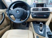 Cần bán xe BMW 320i đời 2014, màu đen nhập khẩu