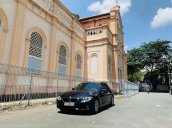 Cần bán xe BMW 320i đời 2014, màu đen nhập khẩu