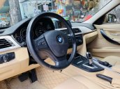 Cần bán xe BMW 320i đời 2014, màu đen nhập khẩu