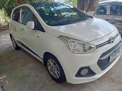 Cần bán Hyundai Grand i10 1.2 AT năm 2014, màu trắng, xe nhập 