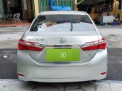 Cần bán Corolla Altis 1.8G 2015 màu bạc như mới