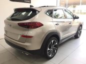 Bán Hyundai Tucson 1.6 AT Turbo đời 2019, màu vàng, giá 910tr