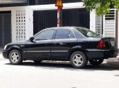 Chính chủ bán Ford Laser 1.6MT đời 2003, màu xanh dưa