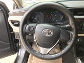 Bán Toyota Altis G 1.8AT màu đen vip số tự động sản xuất 2015 biển Bình Dương