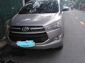 Cần bán Toyota Innova đời 2016, màu bạc xe gia đình