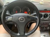 Cần bán gấp Mazda 6 đời 2003, màu đen, số sàn