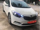 Bán xe Kia K3 2014, màu trắng số sàn, 420 triệu