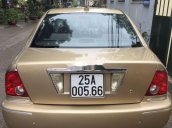 Bán xe Ford Laser đời 2002, màu vàng cát