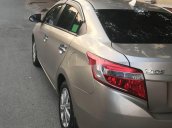 Bán lại xe Toyota Vios năm 2017, màu vàng cát