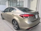 Cần bán xe Kia Cerato 1.6AT 2017, màu vàng, 555 triệu