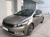 Cần bán xe Kia Cerato 1.6AT 2017, màu vàng, 555 triệu