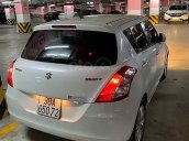 Bán Suzuki Swift 1.4 AT đời 2015, màu trắng, xe đẹp  