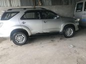 Cần bán Toyota Fortuner MT đời 2012, màu bạc