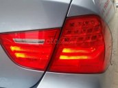 Cần bán xe BMW 320i, sản xuất 2010, số tự động, màu xanh đá