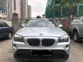 Cần bán em Bmw X1 số tự động 2010, màu xám bạc