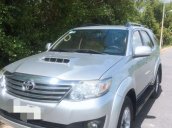 Bán Toyota Fortuner MT sản xuất 2014, màu bạc số sàn