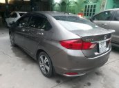 Bán Honda City 1.5AT màu nâu titan, số tự động, sản xuất 2014 mẫu mới, biển Sài Gòn, đi 45.000km