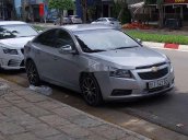 Cần bán xe Chevrolet Cruze 1.6MT đời 2010, màu bạc, xe nhập 