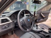 Bán xe BMW 3 Series 320i đời 2014, màu đen