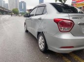 Cần bán xe Hyundai Grand i10 đời 2015, màu bạc, nhập khẩu số tự động