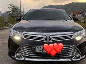 Cần bán gấp Toyota Camry sản xuất năm 2016, màu đen chính chủ, giá 970tr