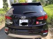 Cần bán xe Hyundai Santa Fe năm sản xuất 2016, màu đen, xe gia đình