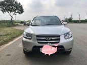 Bán Hyundai Santa Fe đăng ký 2009, màu bạc, giá 555 triệu đồng