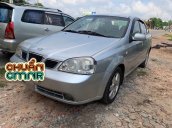 Cần bán lại xe Daewoo Lacetti đời 2004, màu bạc xe gia đình, còn nguyên bản