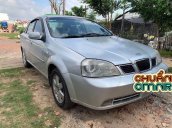 Cần bán lại xe Daewoo Lacetti đời 2004, màu bạc xe gia đình, còn nguyên bản