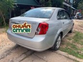 Cần bán lại xe Daewoo Lacetti đời 2004, màu bạc xe gia đình, còn nguyên bản