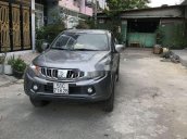 Cần bán xe Mitsubishi Triton đời 2015, màu bạc, nhập khẩu nguyên chiếc chính hãng