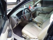 Cần bán xe Ford Laser 1.8AT 2004, màu đen như mới giá tốt